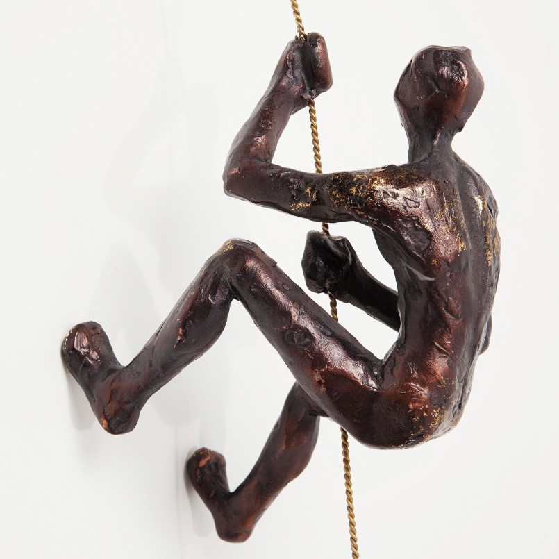 Wall decoration in the shape of a mountaineer: statuette of a climber / climber
